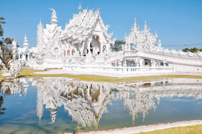 The Monastery At Wat Rong Khun Or The White Temple In Chiang Rai Province, Thailand