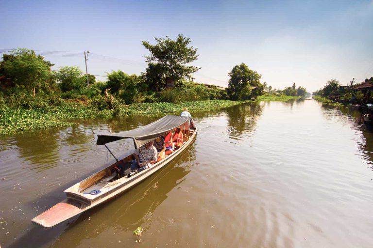 Tourist In The Longtail Boat In Mahasawat Canal In Nakhon Pathom