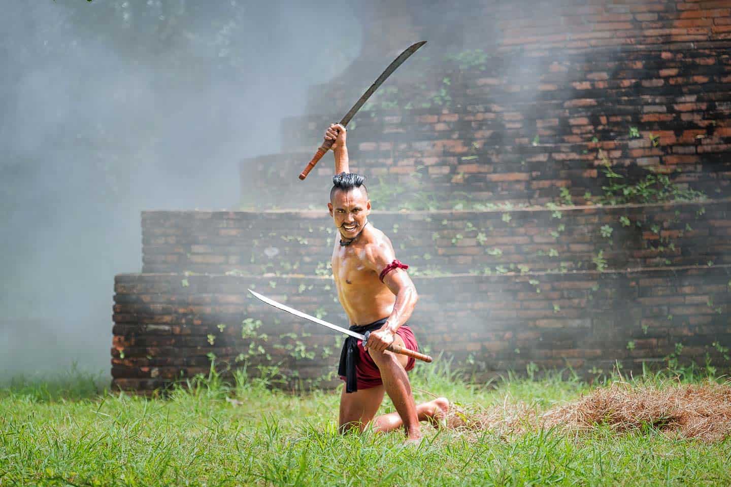 Thai Legend Warrior Action. Ancient Soldier Holding Swords Ready