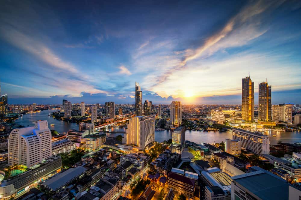 cityscape bangkok city from roof top bar hotel with chao phraya river