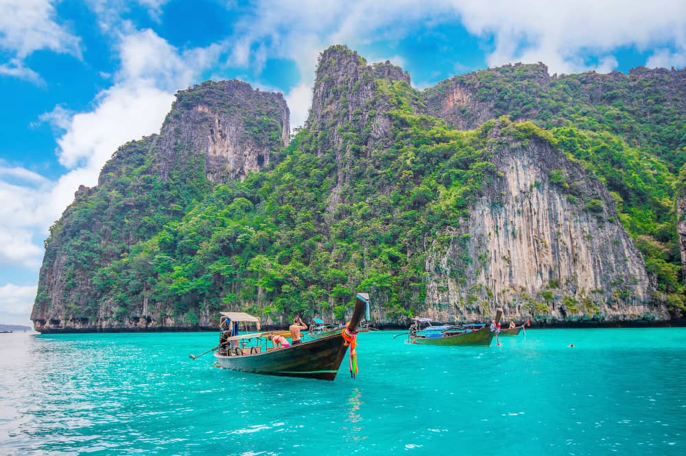 long boat blue water maya bay phi phi island krabi thailand
